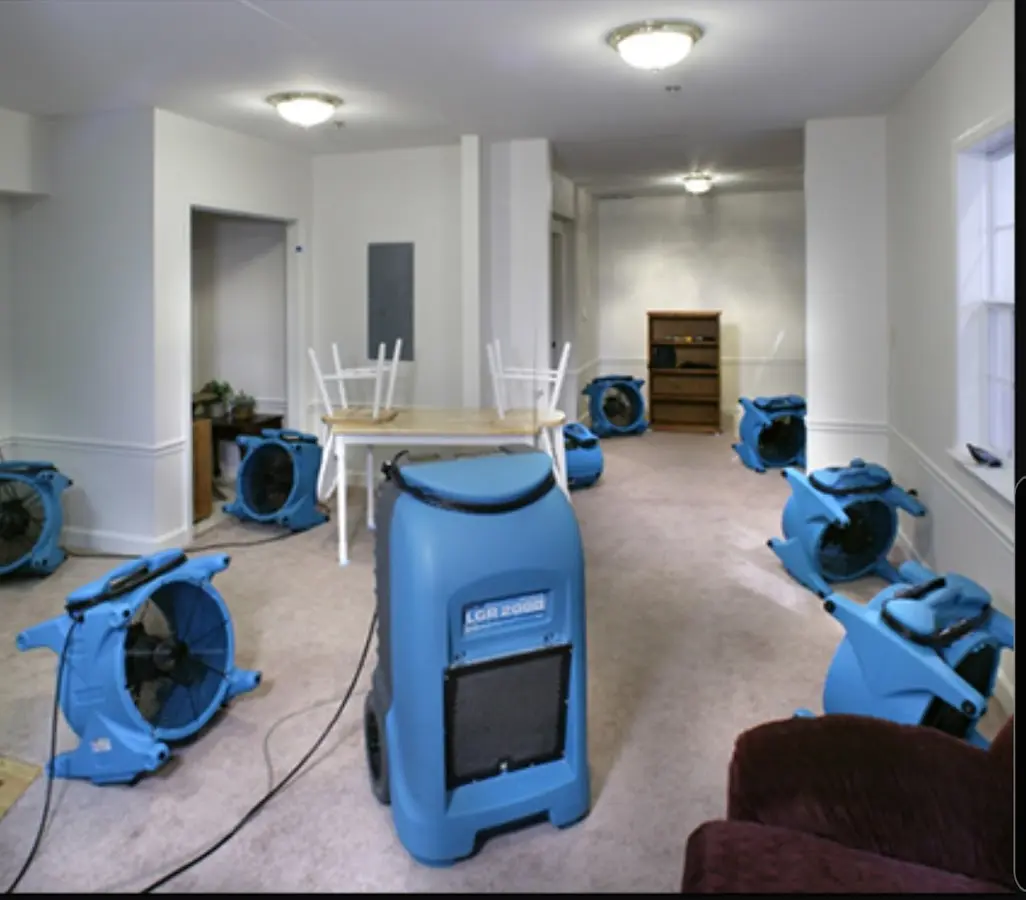 Air movers and dehumidifier setup for Water Damage Restoration in East Granby